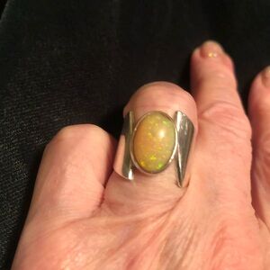 Sterling silver ring with opal . It is a size 7.